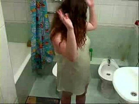 Have a look to my cute sister in bathroom. Hidden cam