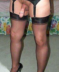 Crossdresser covers cock with stocking