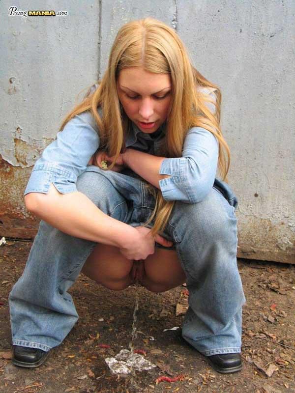 Mature redhead peeing streets with