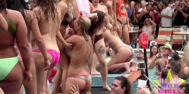 Pool side lovers enjoy each