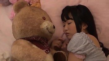 Chinese girl is playing with her teddy bear part2.