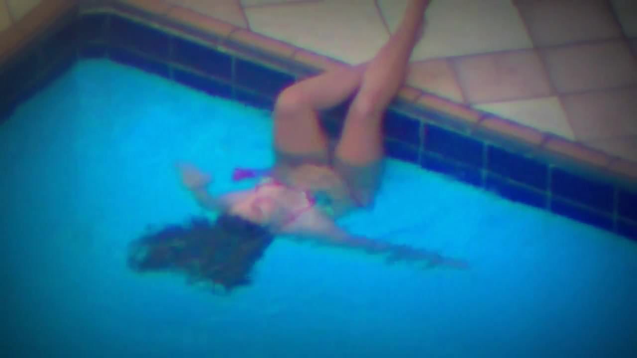 Teen masturbates swimming pool