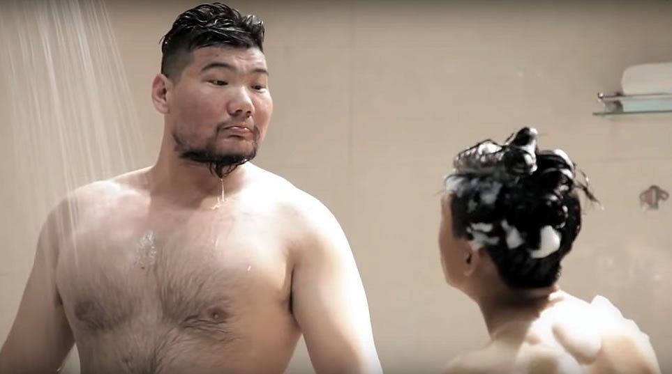 Asian man and woman in shower