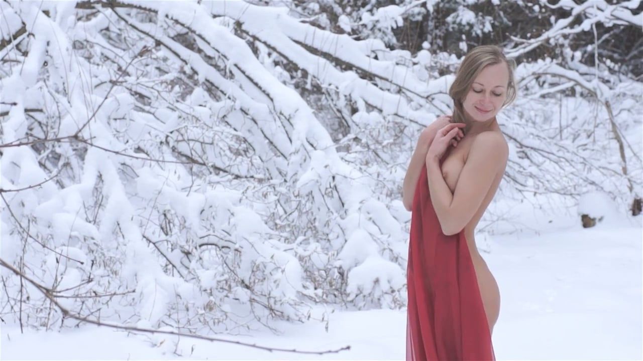 Nude girl in snow photo