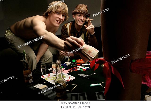 Adults playing strip poker