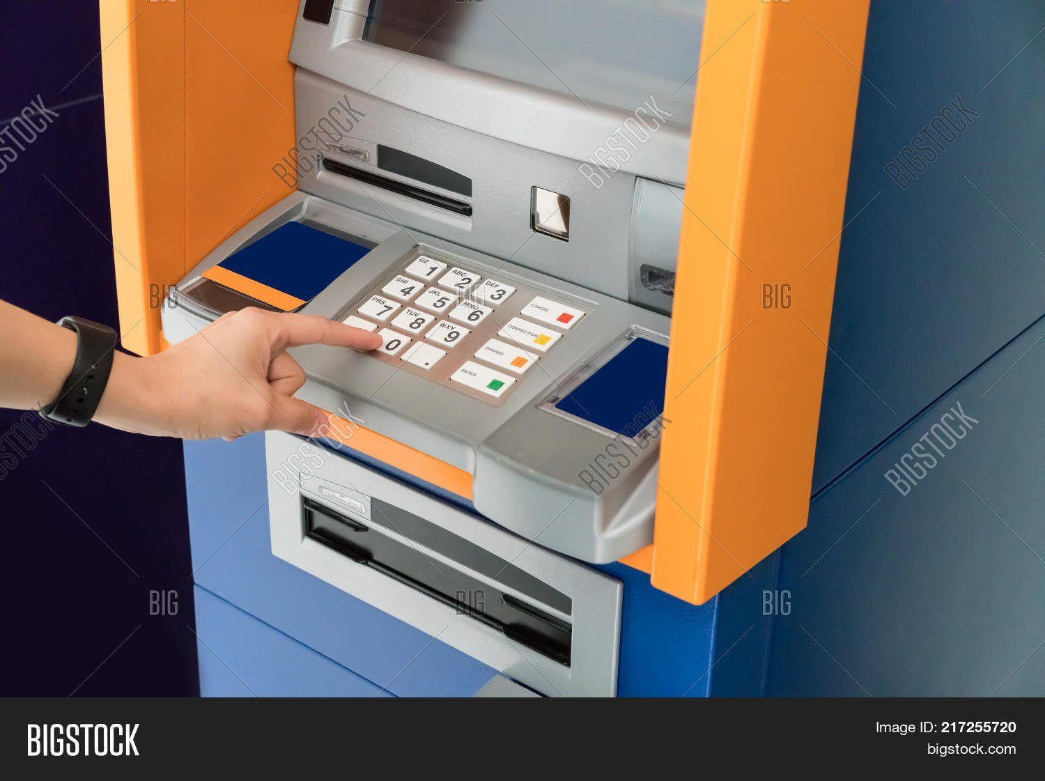 Asian lady at atm machine