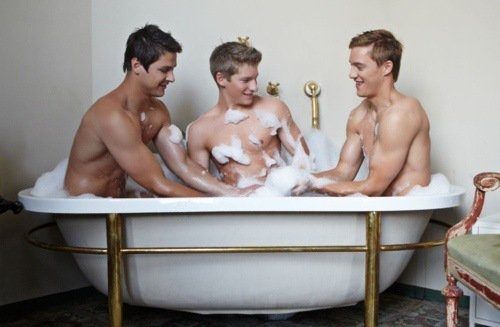 Gay men in bath tub