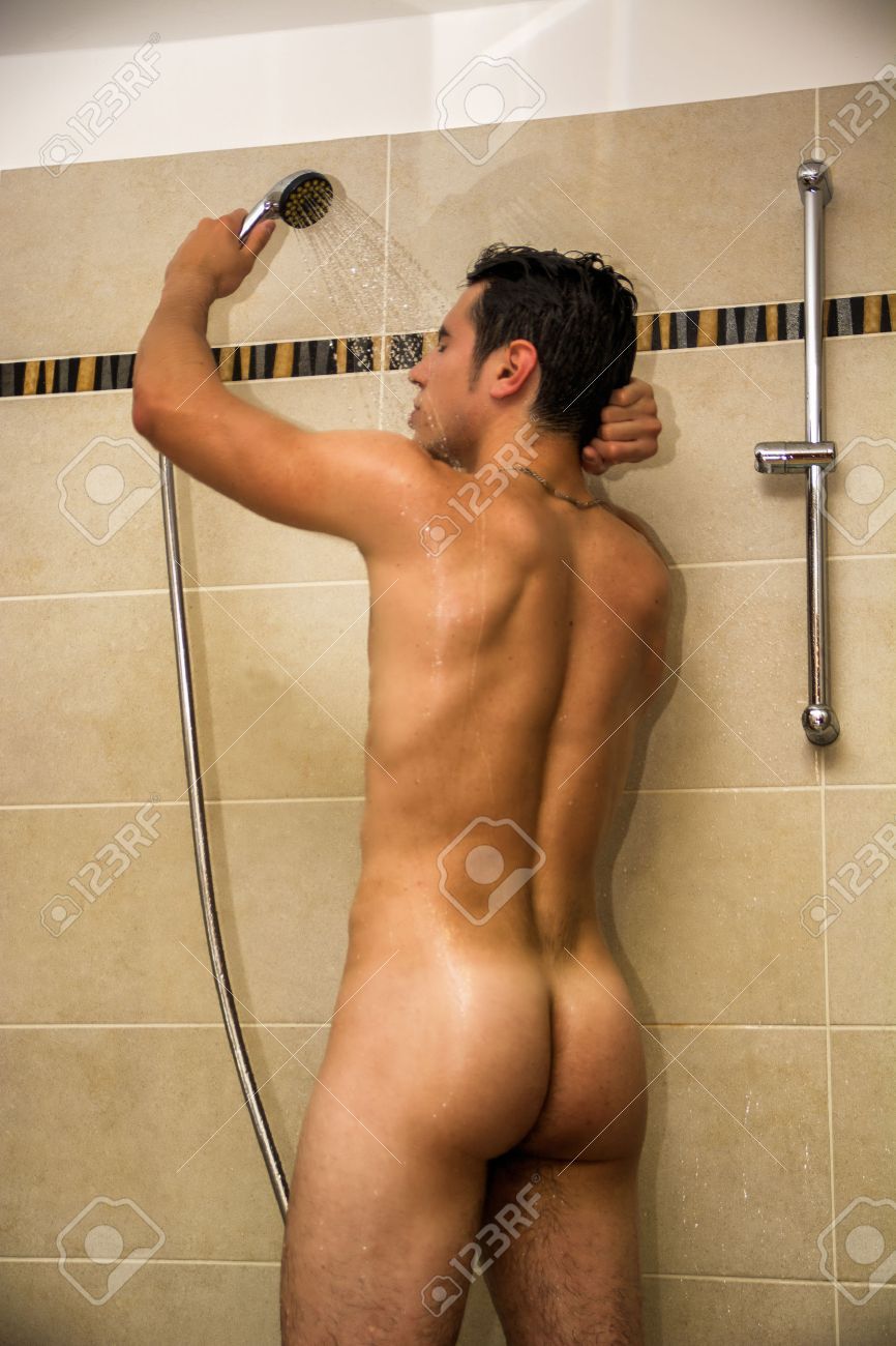 Naked guy taking a shower