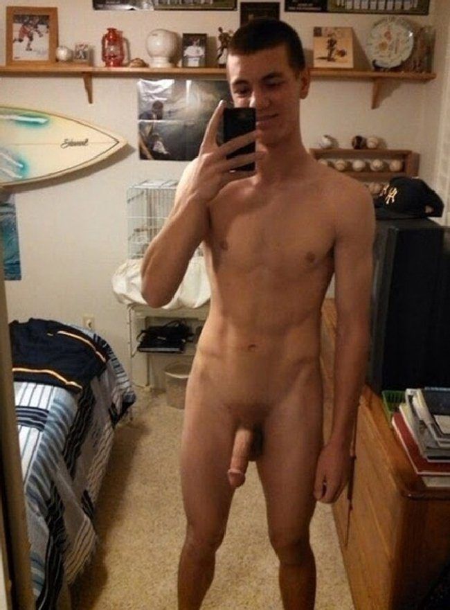 Naked teen boy in bedroom