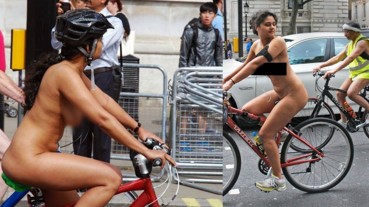 Nude girl reading bike