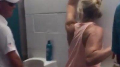 Pixtures women peeing in urinal